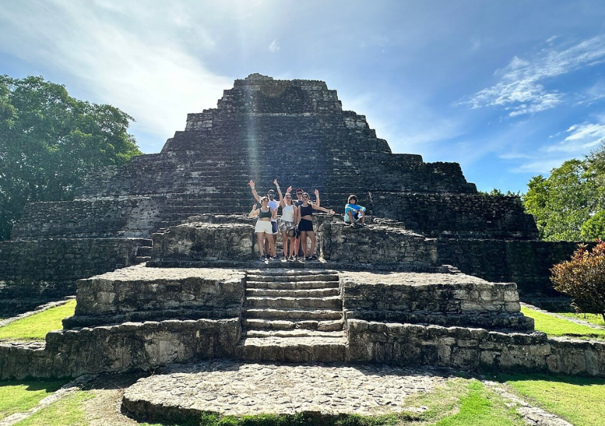 People in front of Chacchoben ruins in Yucatan Peninsula, Quintana Roo, Mexico, one hour away from the luxurious gated community housing development Ichkabal Villas and the 60km long freshwater lake, the Bacalar Lagoon, alongside Mexico's prized Pueblo Magico, Bacalar.