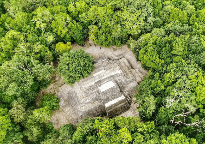 Aerial drone shot of pyramid at Ichkabal Ruins, Zona Arqueológica de Ichkabal, Ichkabal, Quintana Roo, Yucatan Peninsula, México 77903