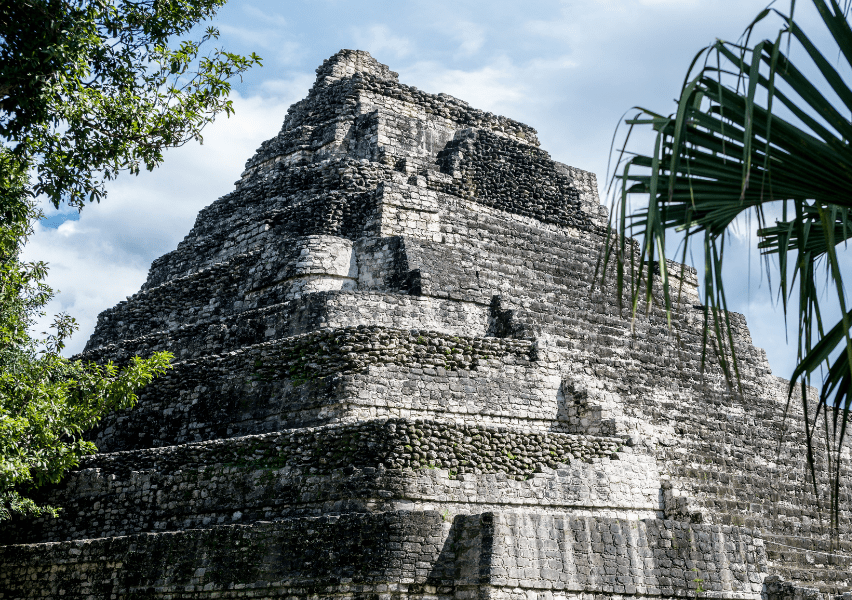 Mayan pre-Columbian pyramid at Chacchoben, translating to "place of the red corn", Archaeological Zone. Settlement by the Maya at the site is estimated at 200 BC, and the structures date from 700 AD. Chacchoben was the biggest Mayan ruins site found in the region of Los Lagos.