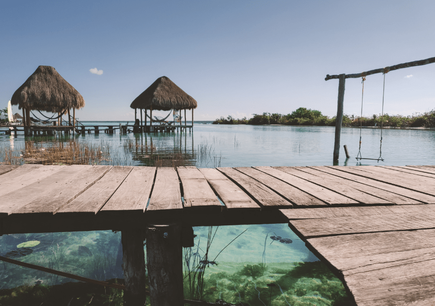 La Laguna de Siete Colores de Bacalar, one of Mexico's Pueblo Magicos. The crystal clear water of the lake are caused by the array of natural salts and minerals in the water, as well as due to the stromatolites presence in the ecosystem.